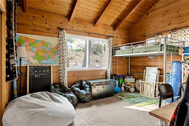 bedroom with lofted ceiling with beams, wood ceiling, wooden walls, and carpet flooring