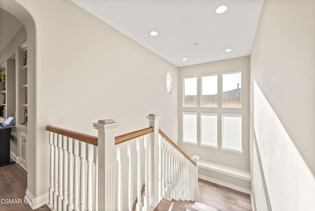 staircase featuring hardwood / wood-style flooring