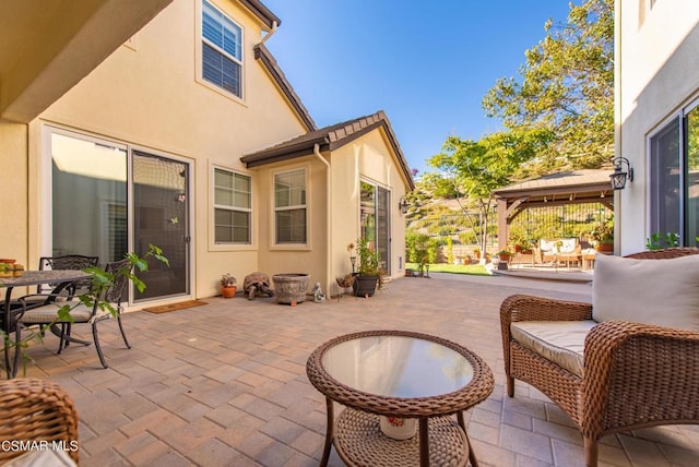 view of patio featuring a gazebo