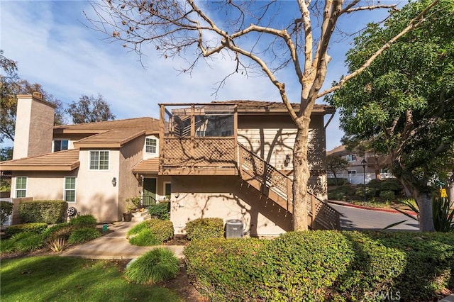 view of front of house featuring central AC unit