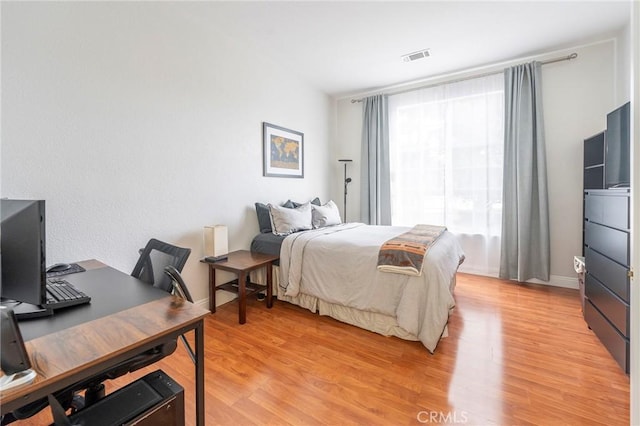 bedroom featuring light hardwood / wood-style flooring