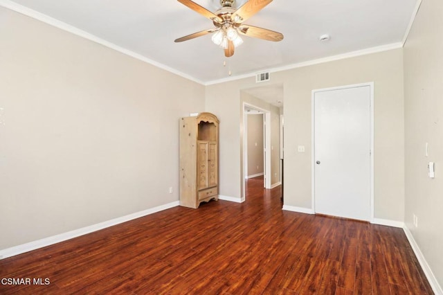 unfurnished bedroom with ceiling fan, dark hardwood / wood-style flooring, and crown molding