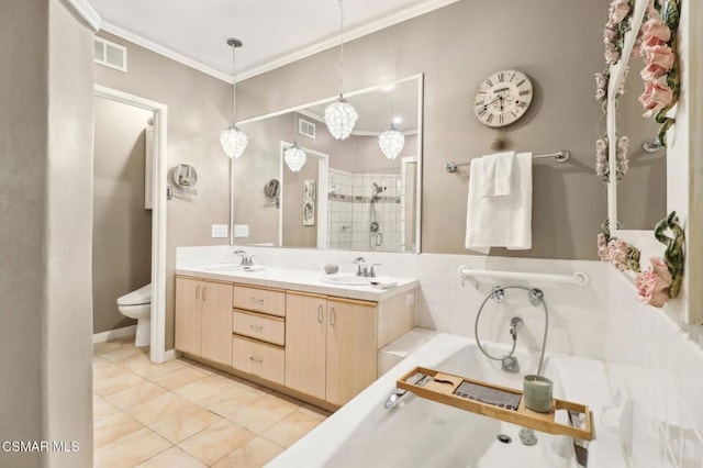 full bathroom with tile patterned floors, vanity, toilet, ornamental molding, and separate shower and tub