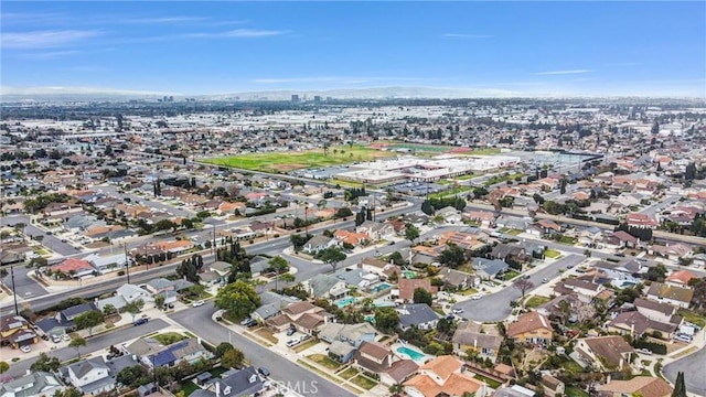 birds eye view of property featuring a residential view and a city view