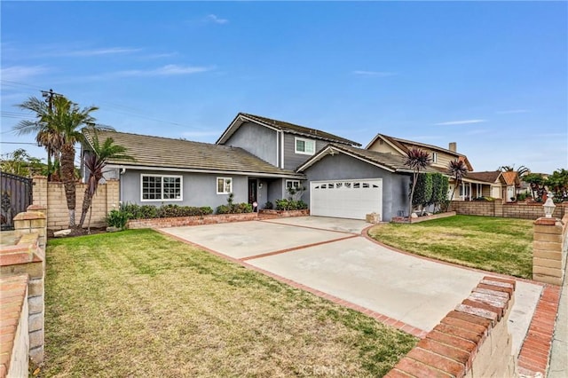 view of front of house featuring a garage and a front yard