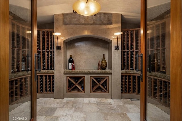 wine cellar with vaulted ceiling