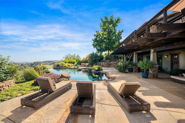 view of swimming pool with a patio area and a pergola