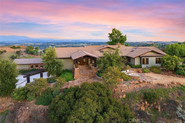 view of front of property with a mountain view