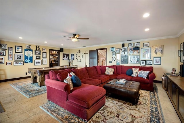 living room with ceiling fan, crown molding, and light hardwood / wood-style floors