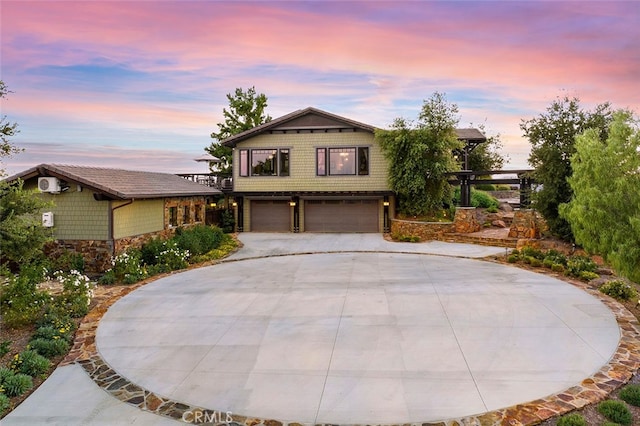 view of front of property with a garage