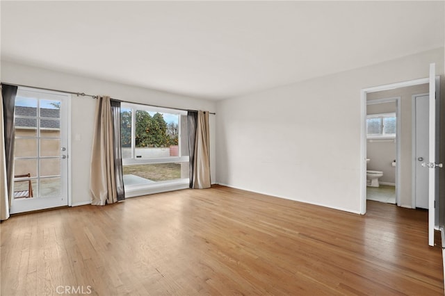 unfurnished room featuring hardwood / wood-style floors