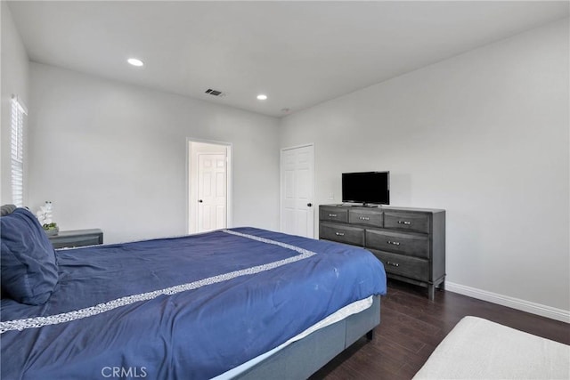 bedroom featuring dark wood-type flooring