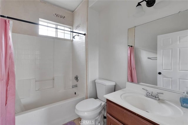 full bathroom featuring toilet, vanity, and shower / tub combo