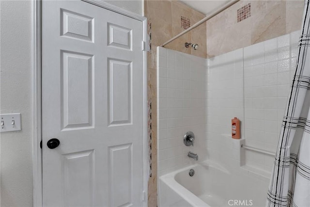 bathroom featuring shower / bath combination with curtain