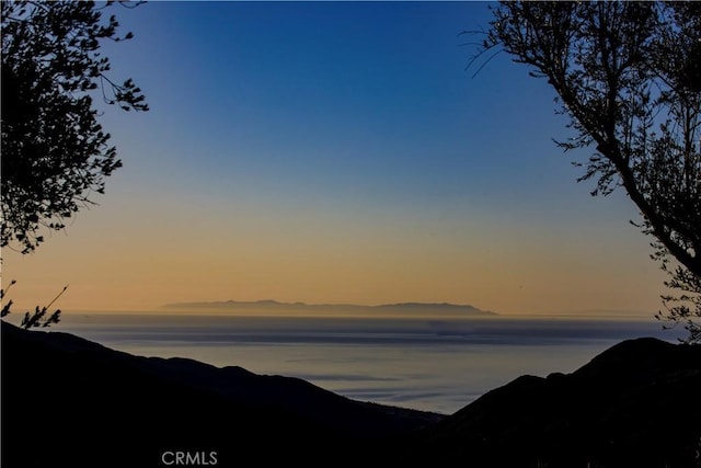 property view of water featuring a mountain view