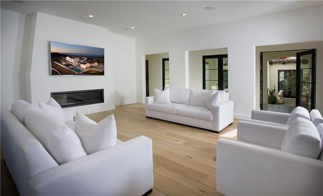 living room featuring light wood-type flooring