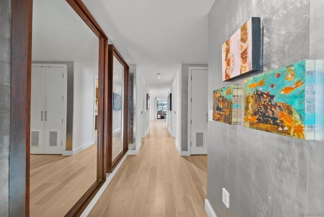 hall featuring light hardwood / wood-style floors