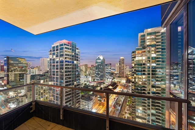 view of balcony at dusk