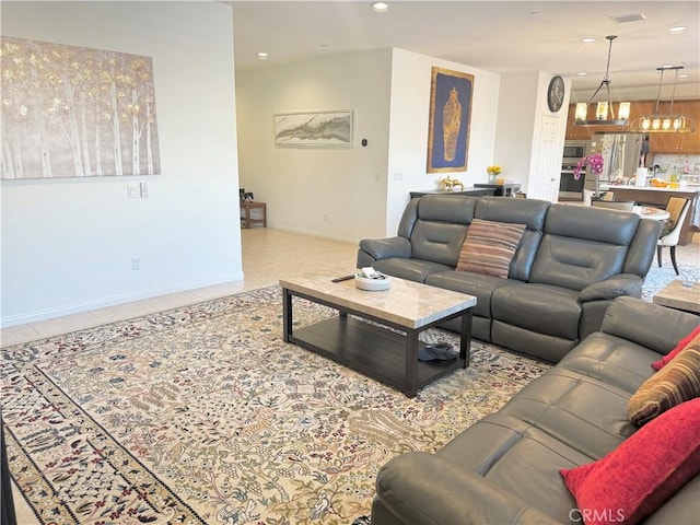 living room with light tile patterned floors