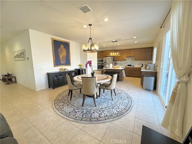 dining room featuring light tile patterned floors