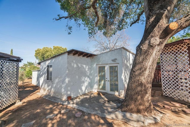 rear view of house with french doors