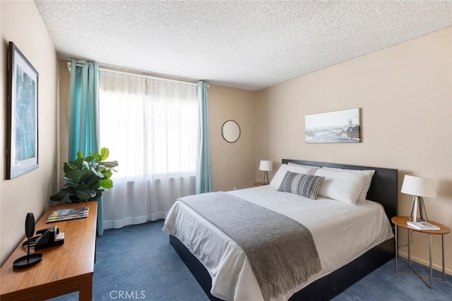 338 N Clybourn Ave, Burbank, CA 91505 - bedroom with carpet flooring, a textured ceiling, and baseboards