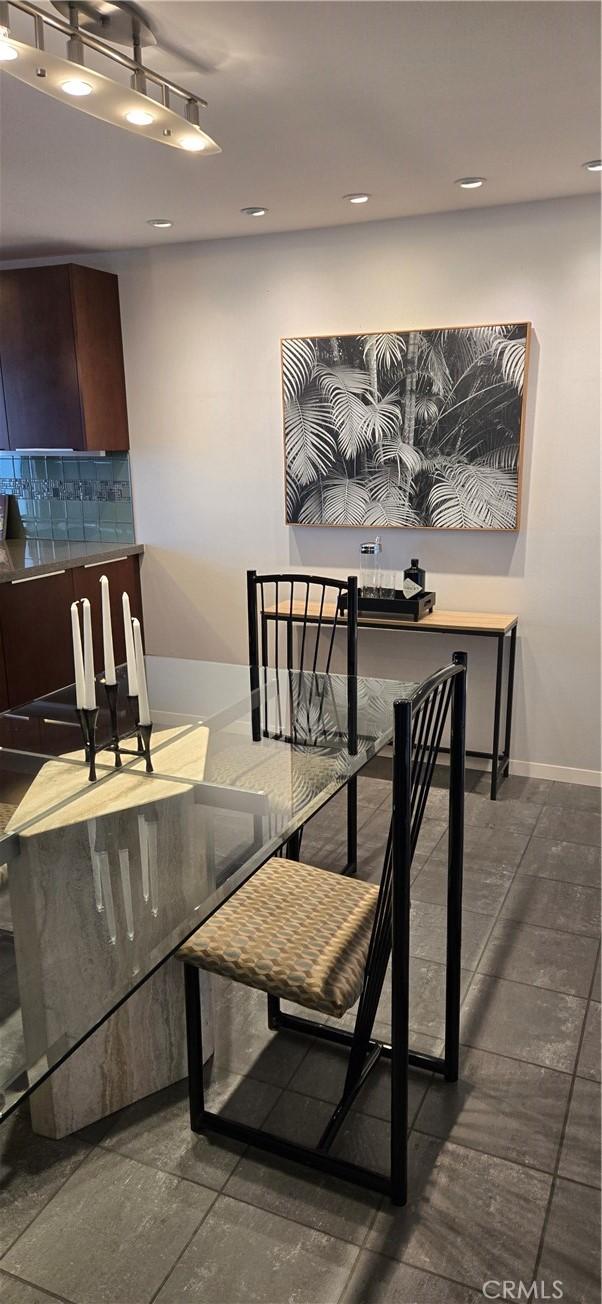 338 N Clybourn Ave, Burbank, CA 91505 - dining space featuring baseboards and recessed lighting