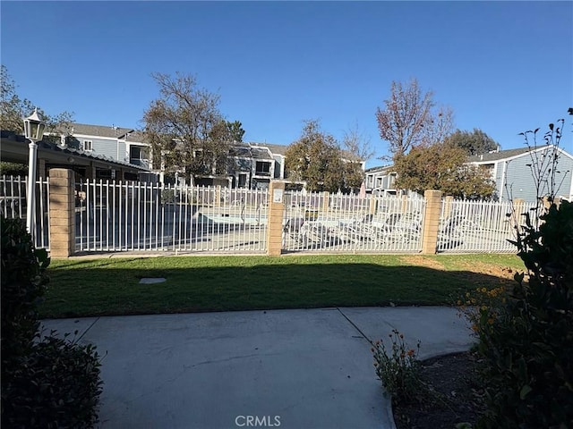 exterior space featuring a pool and a patio