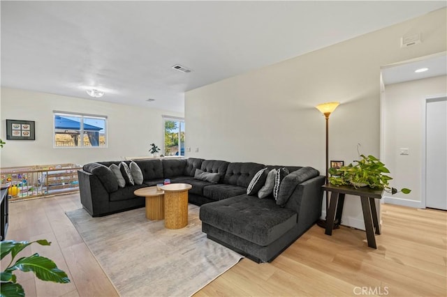 living room featuring light wood-type flooring