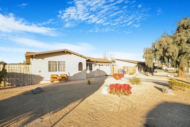 ranch-style house with a garage