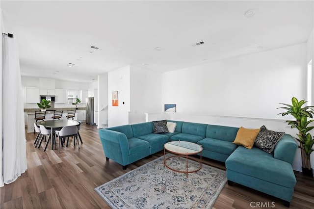 living room featuring wood-type flooring