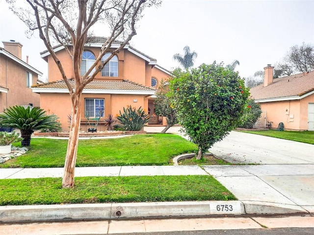 view of front of home with a front lawn