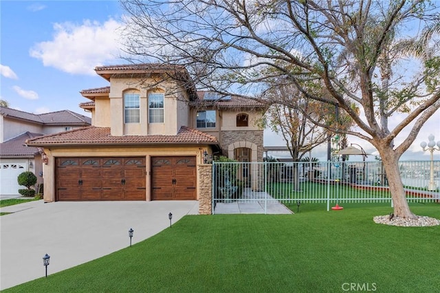 mediterranean / spanish-style home featuring a front yard and a garage