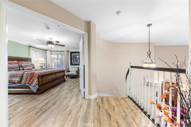 bedroom with light hardwood / wood-style flooring