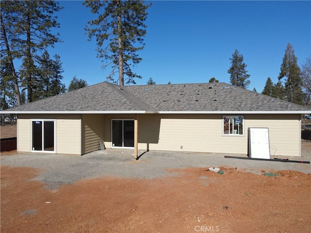 back of house with a patio area