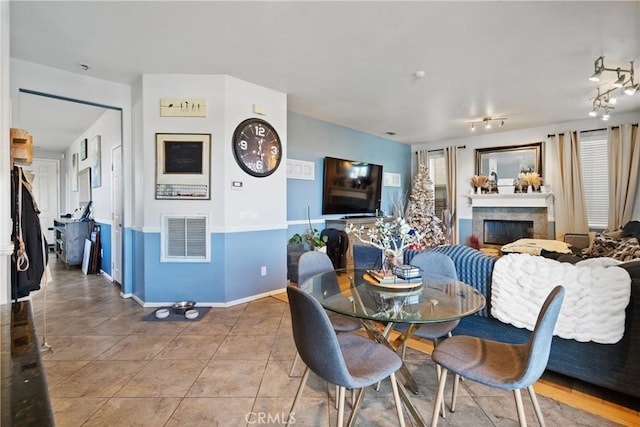 dining area with tile patterned floors