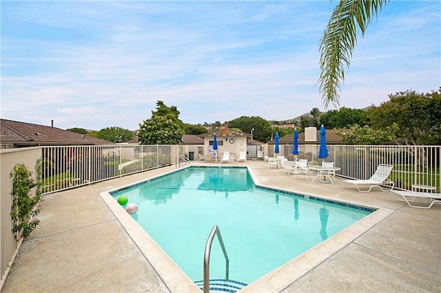 view of pool featuring a patio area