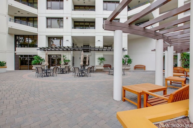 view of patio featuring a pergola