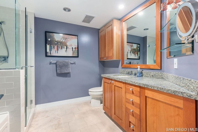 bathroom featuring tile patterned floors, toilet, walk in shower, and vanity