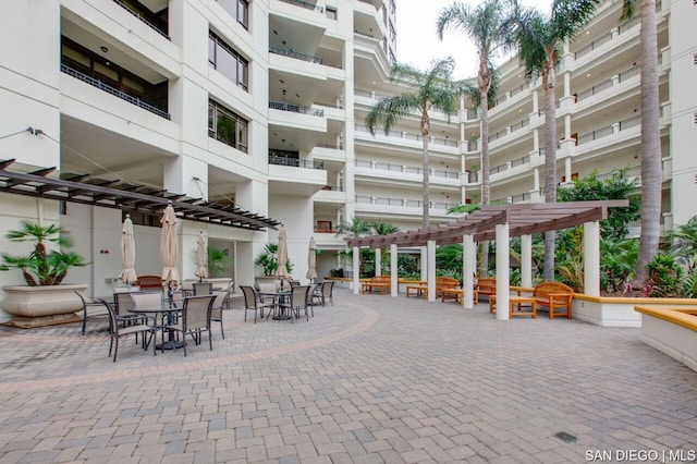 surrounding community featuring a pergola