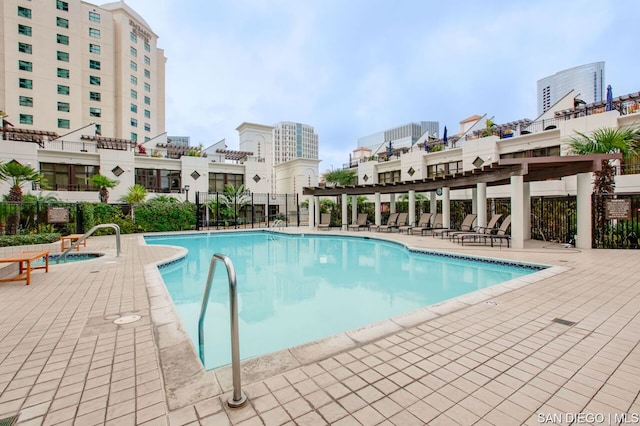 view of pool featuring a patio and a pergola