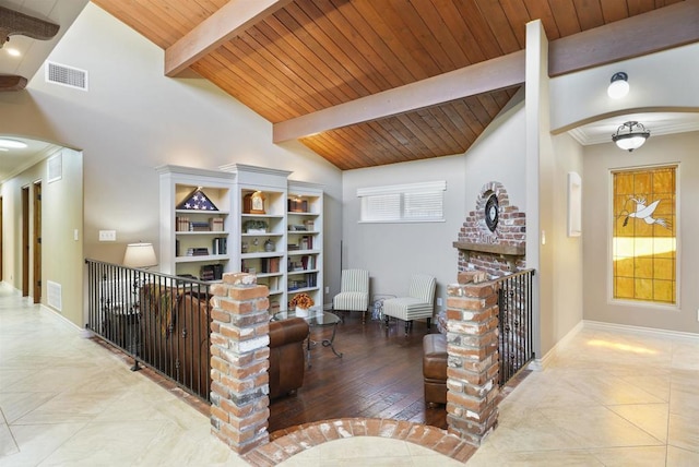 living room featuring wooden ceiling and lofted ceiling with beams