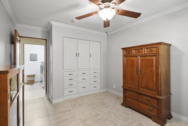 bedroom featuring ceiling fan, a closet, and crown molding