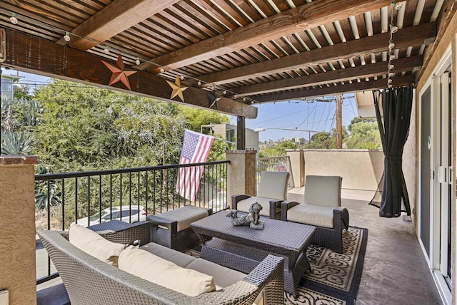 view of patio featuring ceiling fan, an outdoor hangout area, and a balcony