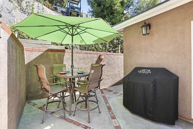 view of patio / terrace featuring a grill