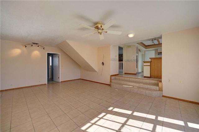 unfurnished room featuring ceiling fan and light tile patterned flooring