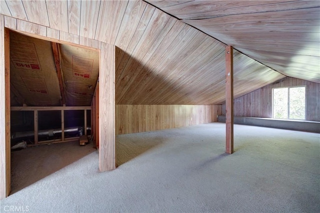 bonus room with wooden ceiling, carpet flooring, and vaulted ceiling