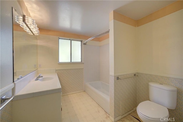 full bathroom with toilet, shower / washtub combination, and vanity