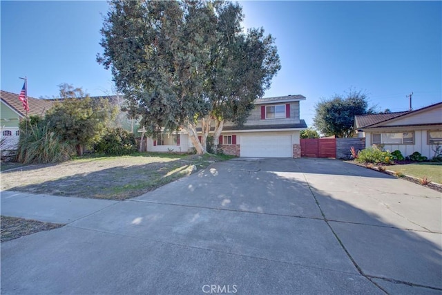 view of front facade with a front lawn and a garage