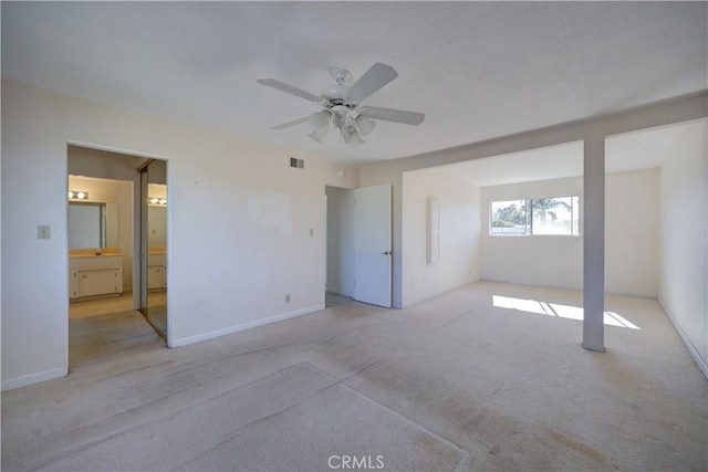 carpeted empty room with ceiling fan